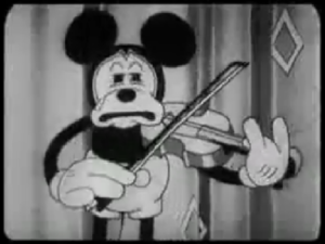 バイオリンの演奏中に感極まって泣くミッキー