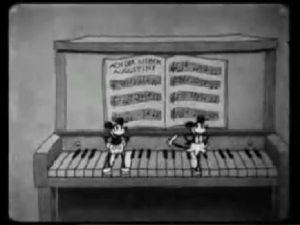 ピアノの上で踊るミッキーとミニー