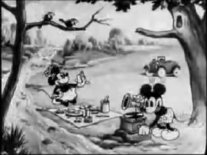 川辺でピクニックをするミッキーとミニー