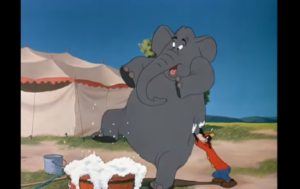ゾウのドロレスを洗おうとするグーフィー